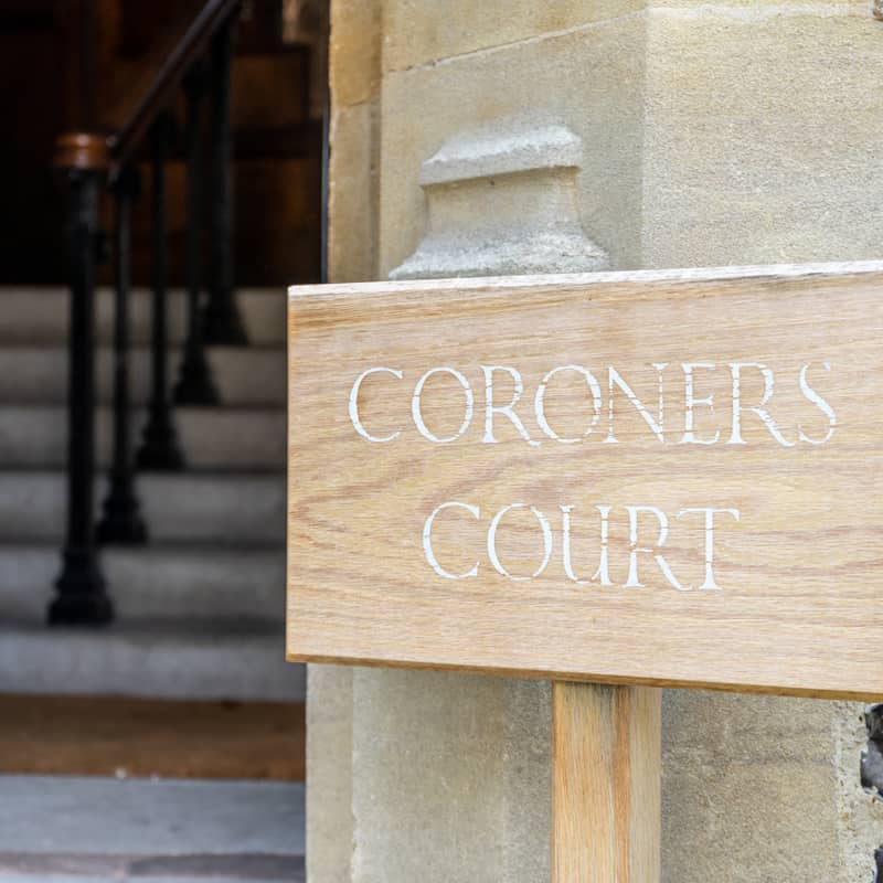 Sign outside a coroners court.